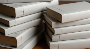 neutral covered books creating minimal bookshelf look