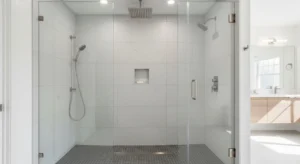 walk in shower with glass panels in modern bathroom
