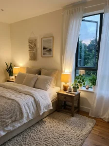 Soft textiles and layered lighting help create a calm bedroom atmosphere.