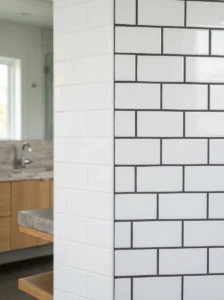 White subway tile with white grout versus gray grout