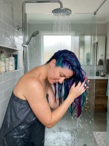 Using cool water to help preserve hair color.