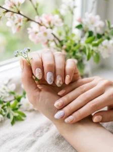 Pastel spring nails with a simple vertical split-color design.
