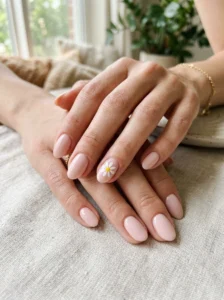 Abstract floral dot clusters on pastel spring nails.