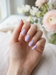 Dreamy pastel cloud-like marble spring nail design.