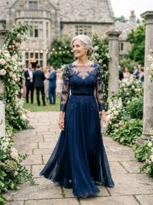 Alt Text: Mother of the bride gown with an illusion lace neckline
