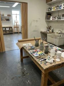 Alt Text: Comfortable art studio designed for extended creative sessions.