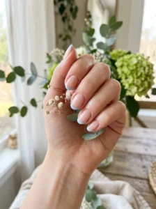 Short nails with soft pastel blue French tips