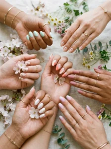Fresh simple spring manicure combining pastel color and subtle seasonal nail art.
