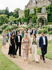 Alt Text: Wedding guests demonstrating the polished balance of a smart casual wedding dress code