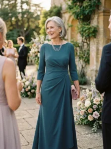 Alt Text: Textured modern mother of the bride dress with elegant fabric details